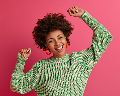 Happy Woman in a green jumper